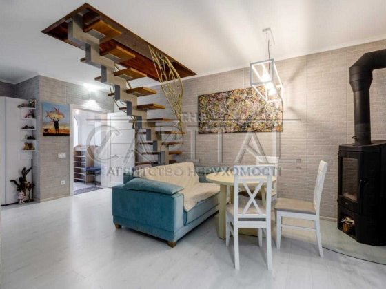 Стильний таунхаус із дизайнерським ремонтом сауною терасою та лісом поруч у Горенічах Гореничи