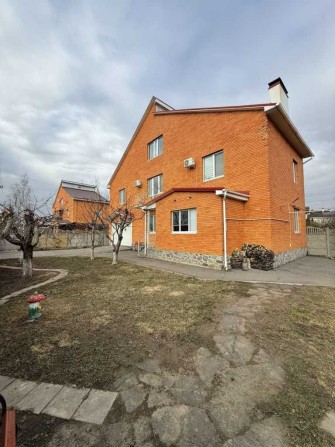 Продам будинок 220кв.м. котел, ремонт меблі ділянка 6,5сот, гараж - фото 1