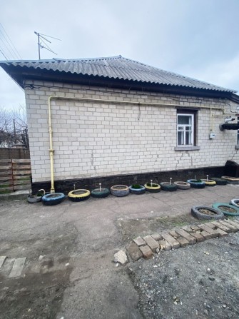 Продаж. 1/2 будинку в центральній частині міста ( район Астри) - фото 1