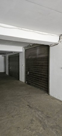 Оренда гаражу в паркінгу з зарядкою для електрокару Львів,вул.Джорджа Вашингтона,17А - фото 1