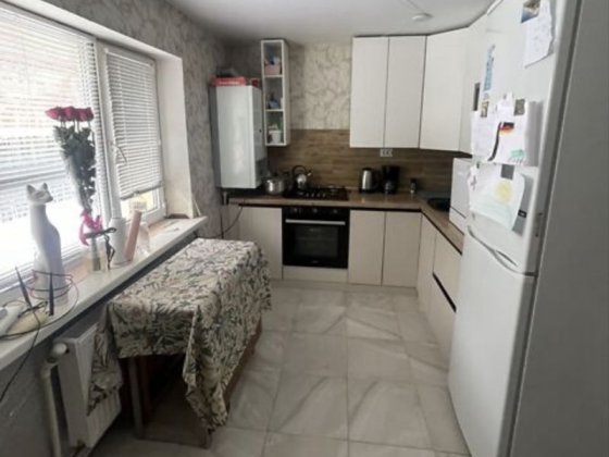 Продам частину будинка з гаражем і госпродарчими  будівлями Винница