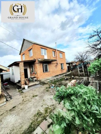 Продам двоповерховий будинок в гарному розташуванні на Новомиколаївці. - фото 1