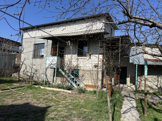 Продаю два будинка  біля річки Николаев