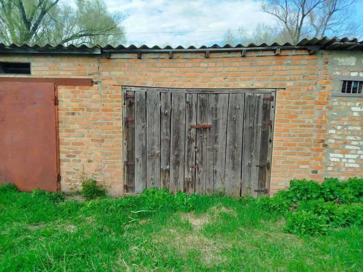 Продам гараж! Місто Буринь.район бані 200 - фото 1