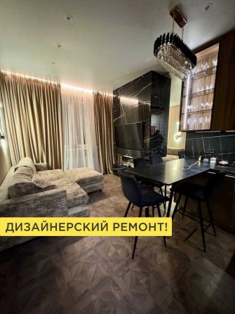 130 тыс.$ Дизайнерская квартира в центре /3-х комнатная /ЖК Инфинити - фото 1