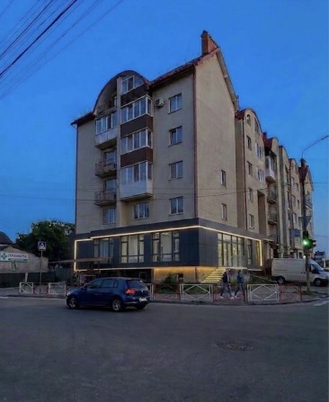 Фасад 100 м² на перехресті - фото 1