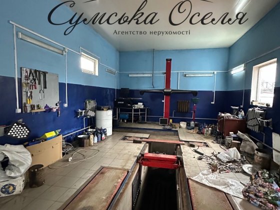 Діюче СТО з будинком на першій лінії