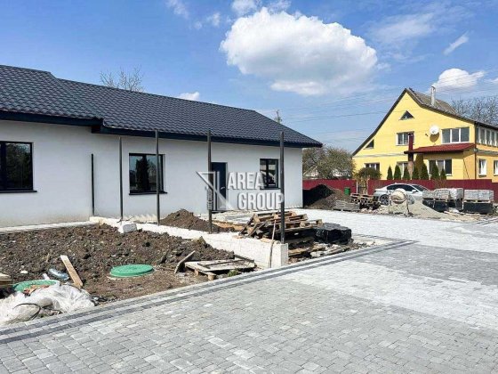 Квартира в клубному будинку з власною ділянкою Кам'янець-Подільський