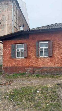 Власна квартира + подвір’я та сараї (центр, вул. Гімназична) - фото 1