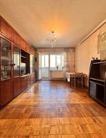 Продам 4-кімнатну квартиру - фото 1