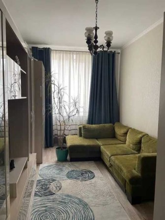 Продажа 2-х комнатной квартиры в центре. - фото 1