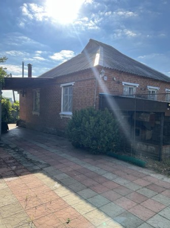 Продам  дом в Изюме - фото 1