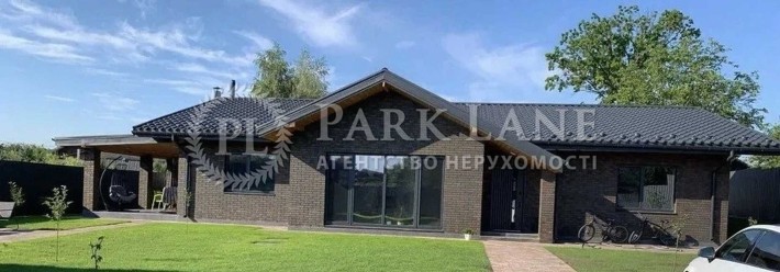 Продаж будинок 218м.кв  місто Українка 9 соток опалення твердопаливне баня гостьовий будинок - фото 1