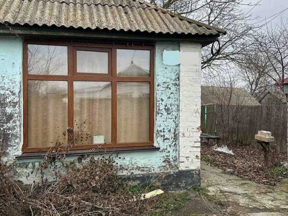 Пів будинку в центрі Баришівки