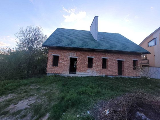 половина будинку та земельна ділянка 2,56 сот., м. Винники Винники