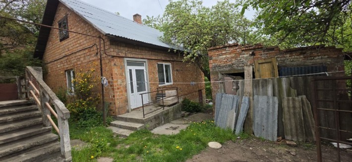 Земельна ділянка 10 с та два будинки. Любі державні програми - фото 1