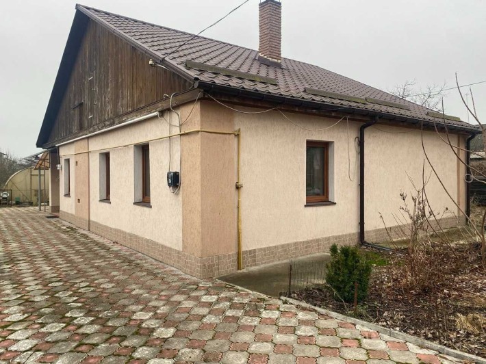 Будинок з просторою ділянкою для ведення господарства у Житомирі - фото 1