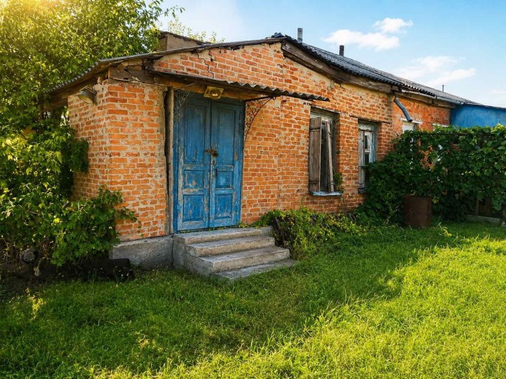 Продам 1/2 будинку в Кобеляках, 10 соток, Шкільна - фото 1