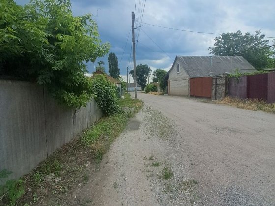 Ділянка з будинком  на раківці