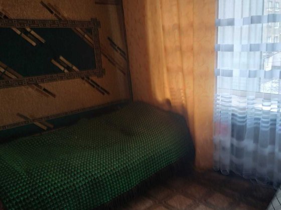 Кімнату в гуртожитку на вул.Станіславського