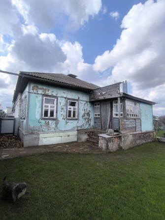 Продаються 1/2 будинку м.Прилуки.вул Густинська. - фото 1