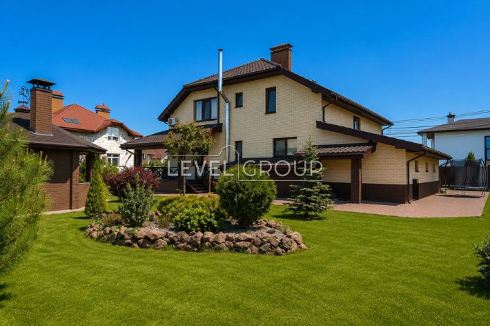 Продаж будинку в с. Крюківщина 24 сотки землі, основний будинок 260 м2 +окрема будівля 126 м2 - саун - фото 1