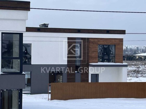 Сучасний двоповерховий котедж площею 185 м² у скандинавському стилі в елітному котеджному містечку « Белогородка