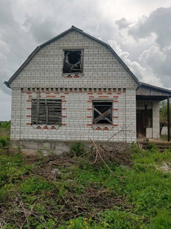 Житловий будинок з земельною ділянкою - фото 1