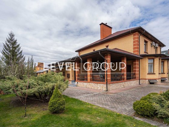 Елітний заміський будинок 419 м² з повноцінним цокольним поверхом у закритому котеджному містечку
