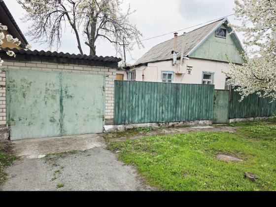 Продаж окремого будинку 59 м² на вул. Олександри Риндовської — ділянка 4.7 сотки, гараж Дніпро