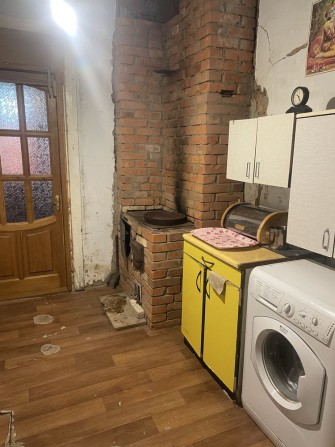 Продається частина домоволодіння  з гаражом  по вул.Бр.Міллер. - фото 1
