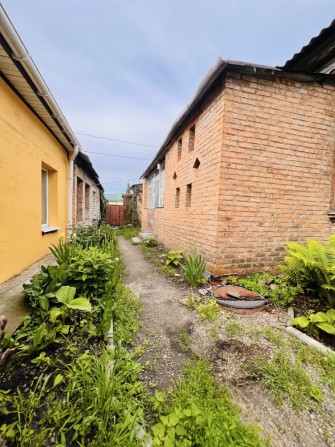 Велика частина будинку в центрі міста 94,5 м.кв., під житло або бізнес, можливий продаж по державним - фото 1