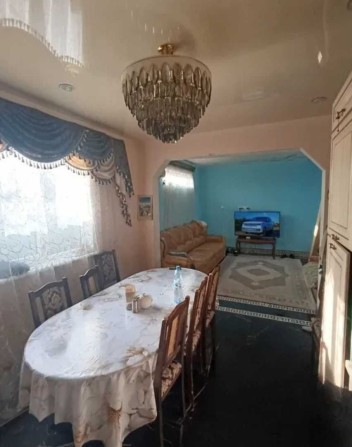 Продам дом с ремонтом. 4 комнаты. 104 кв.м. 15 минут езды до Центра города - фото 1