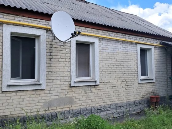 Квартира в бараку з гаражем та городом Звягель