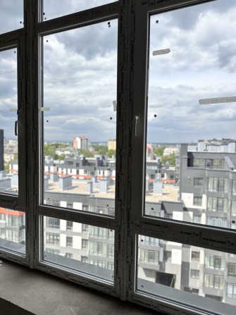 Вид на Карпати та парк Шевченка — 2-кімнатна квартира в ЖК Паркове Містечко,квартира з панорамними в - фото 1