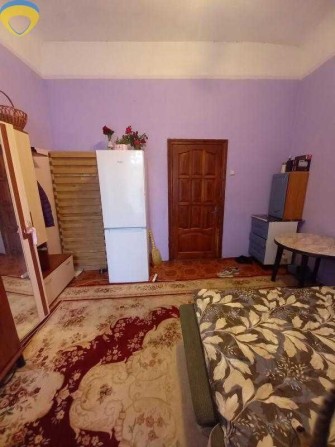 Продам комнату в центре города на улице Нежинская. - фото 1