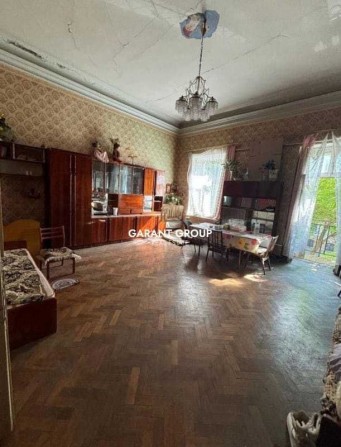 Три кімнати в комунальній квартирі в центрі міста - фото 1