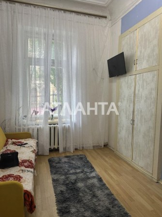 Продам двухуровневую комнату  в центре - фото 1