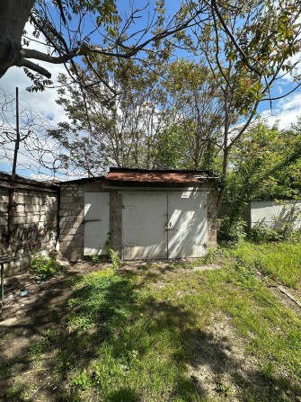 Продам гараж пр. О. Поля, 107Л, погріб, оглядова яма, документи - фото 1