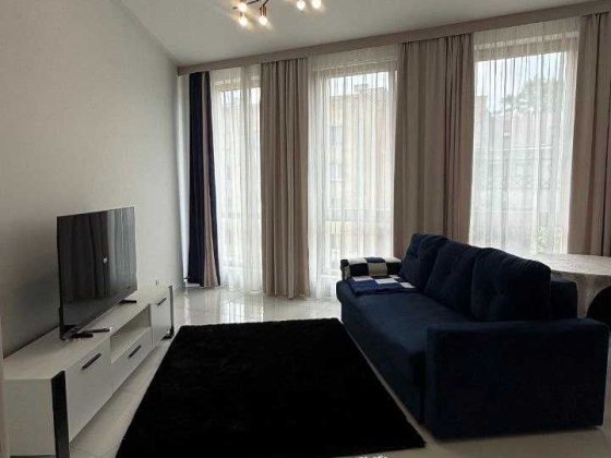 Forum Apartments  Простора 1 спальня + кухня-вітальня  58 м² Львов