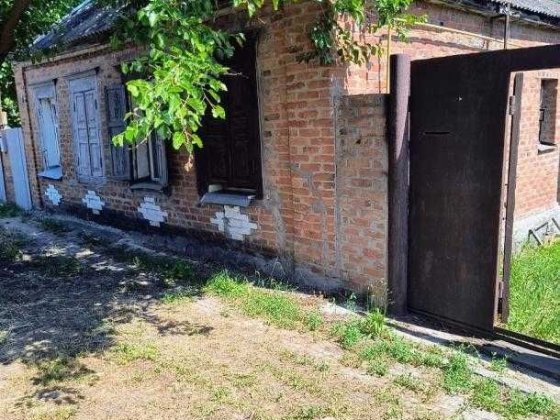 Продам 1/2 дома в центре Змиева Змиев