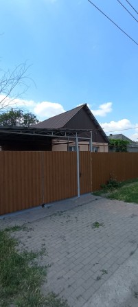 Продам дом с ремонтом в Подгородном - фото 1