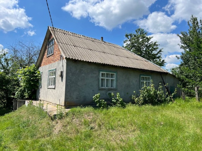 Продається будинок з шлакоблоку,обкладений цеглою на ділянці 15 соток.Кадастровий номер є і на будин - фото 1