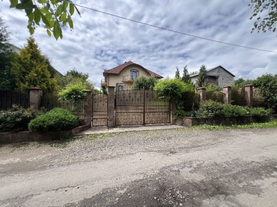 Продаж двоповерхового будинку з ділянкою 10 соток Хмельницкий