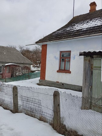 Будинок в місті з земельною ділянкою 6 соток - фото 1