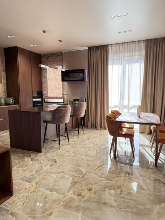 Продаж ШИКАРНОГО дуплексу з РЕМОНТОМ в центрі Бучі - фото 1