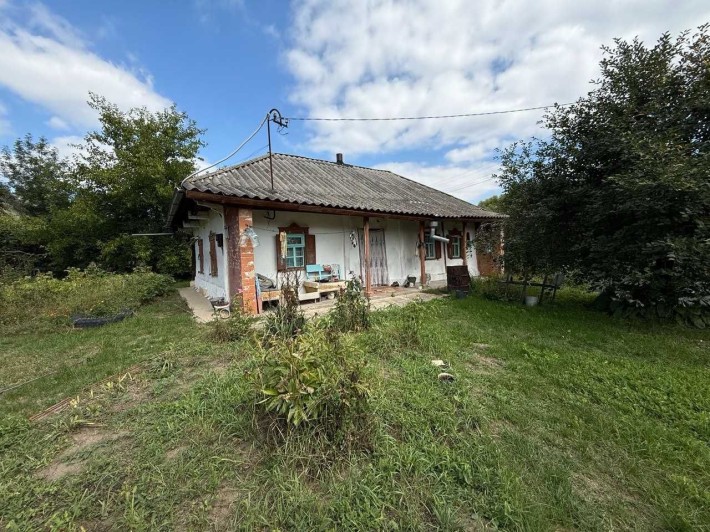 Одноповерховий будинок. 20км до центру міста. Ділянка 21 сотка. Житловий стан. - фото 1
