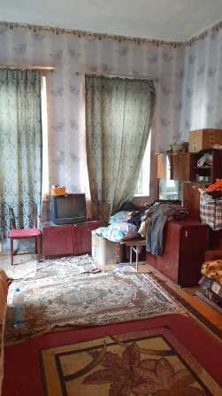 Половина будинку в центрі — варіант, який можна адаптувати під себе або бізнес - фото 1