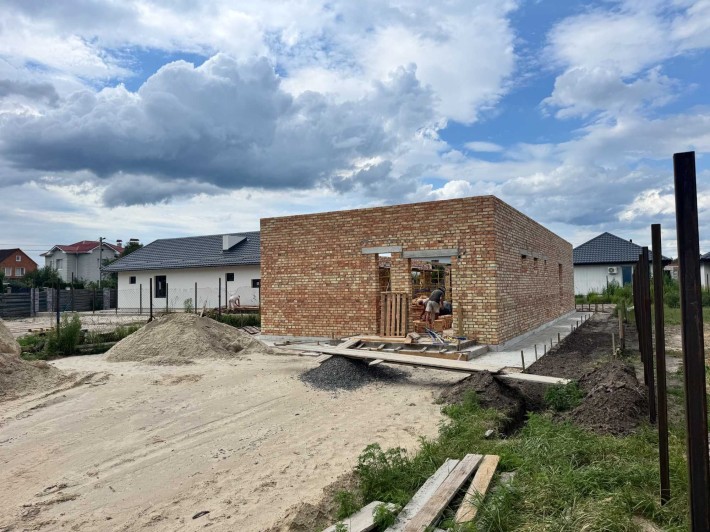 Сучасний одноповерховий будинок 120 м² з терасою - фото 1