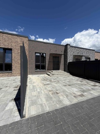Таунхаус 56 м² у Гостомелі, тиха локація, готовий під оздоблення — $56 000. Тепла підлога, газове оп - фото 1